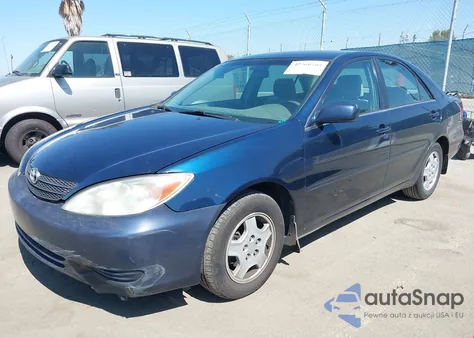 2003 Toyota Camry Le V6 z USA, uszkodzony, nr VIN 4T1BF32K93U050590